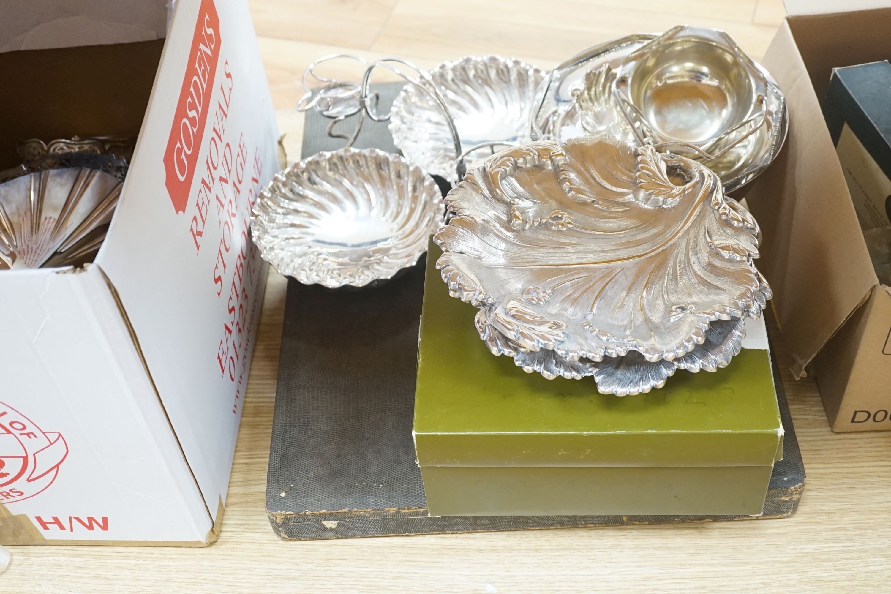 A group of plated wares including a Christofle wine basket